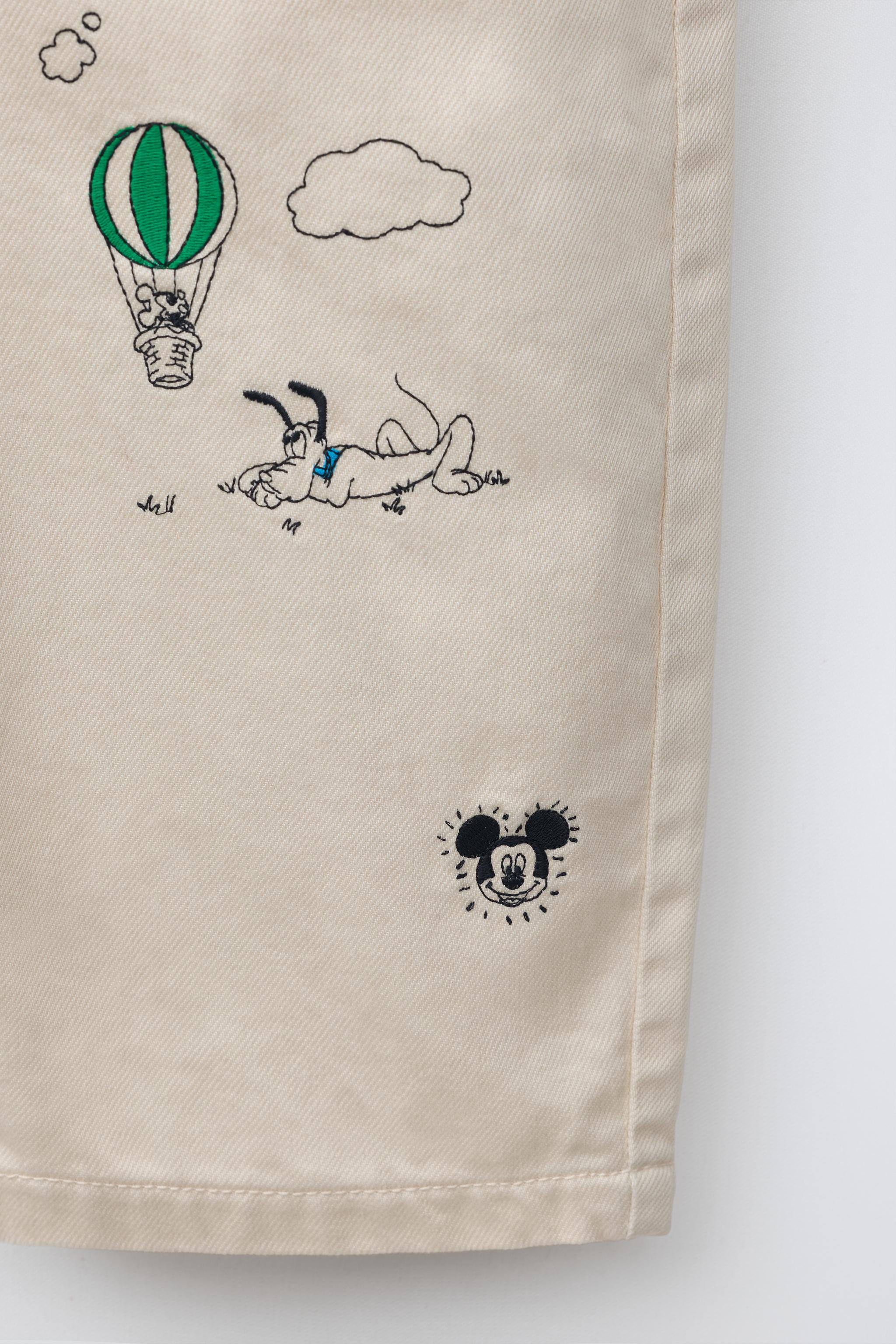 SALOPETTE EN SERGÉ À BRODERIES MICKEY MOUSE © DISNEY